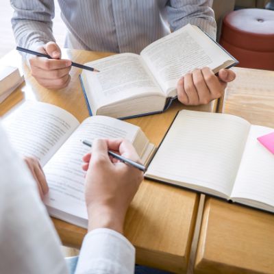 Three people are standing